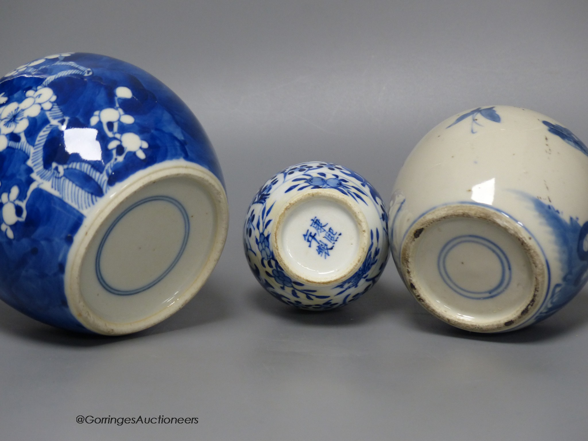 A Chinese blue and white 'ladies' jar, a 'boys' vase and a prunus jar, late 19th / early 20th century, tallest 15cm